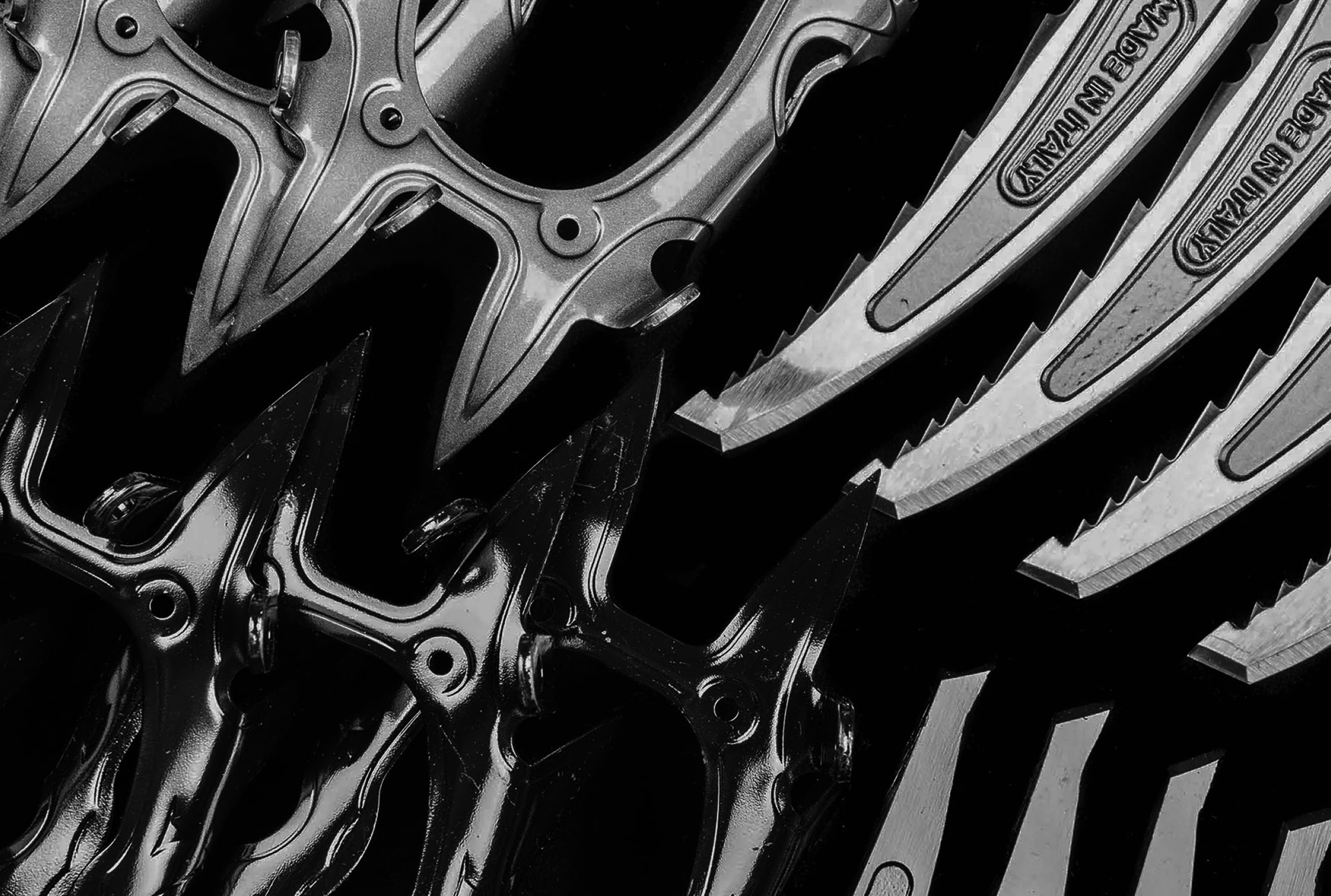 Close-up of Grivel crampon points showing hardened steel construction.