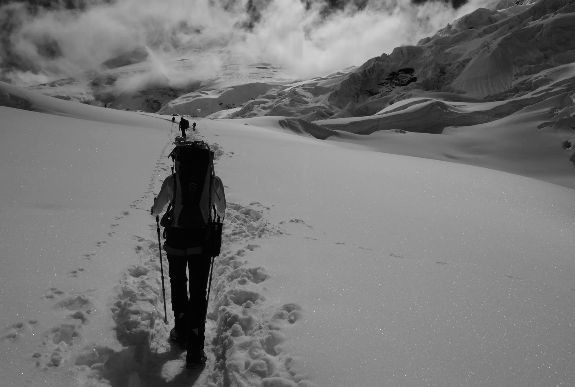 Mountaineer walking through deep snow during the attempt to Pangpoche in Nepal.