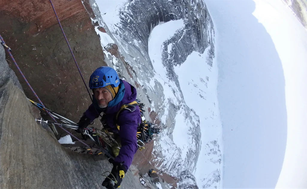Marek Raganowicz on exposed terrain above Sam Ford Fiord