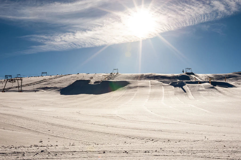 Artificial snow-covered ski slopes in the Alps
