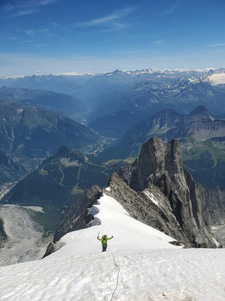 Damien Tomasi on a snow ridge above the Mont Blanc valley