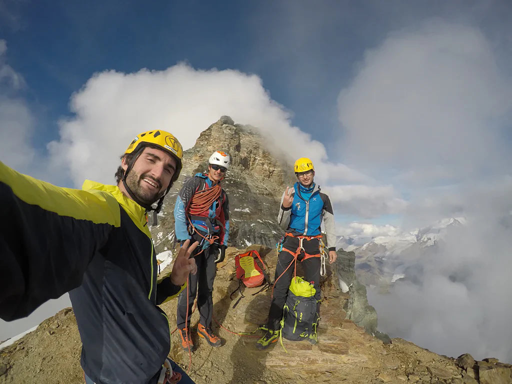 Jerome Perruquet, Michele Cazzanelli, and Stefano “Teto” Stradelli on the summit ridge after completing the route on the Matterhorn south face.