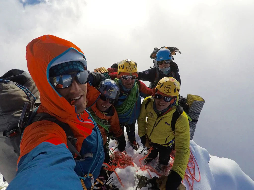 François Cazzanelli and team on a snowy ridge during the Manaslu ascent.