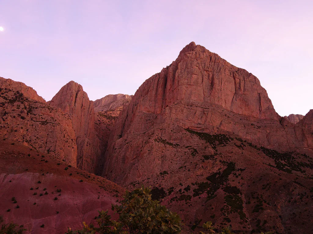 Limestone walls of Taghia at sunset in the Moroccan Middle Atlas.
