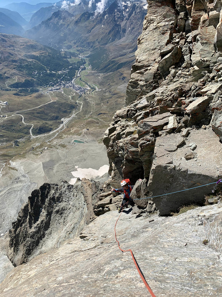 Stefano “Teto” Stradelli ascending steep rock pitches high above Cervinia on the Matterhorn south face.