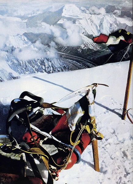 Wooden shaft ice axe used during a high-altitude expedition on an 8000-meter peak.