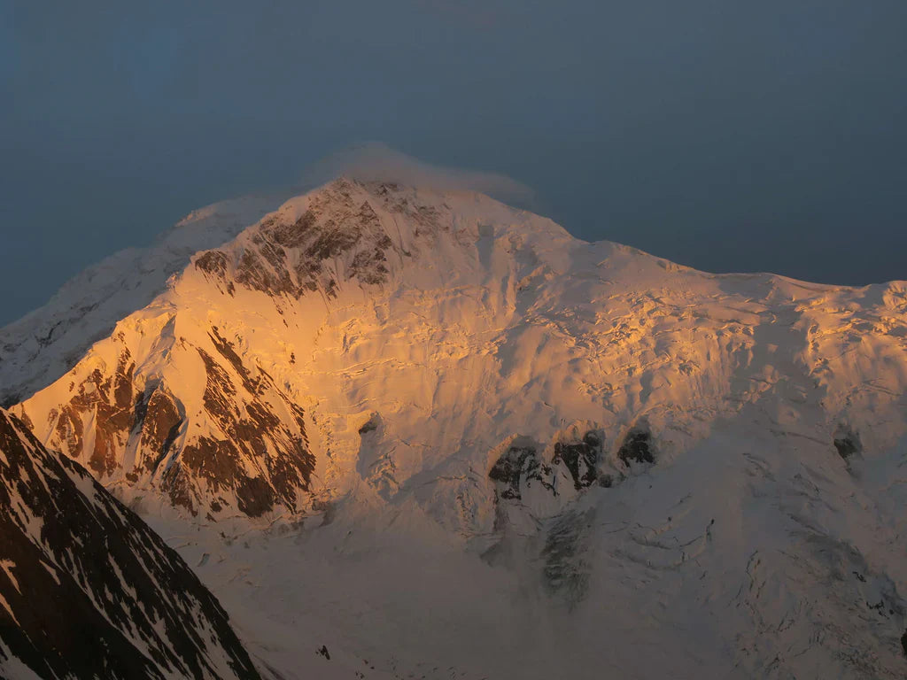 Glaciated mountain face above expedition camp in the Karakoram, Pakistan.