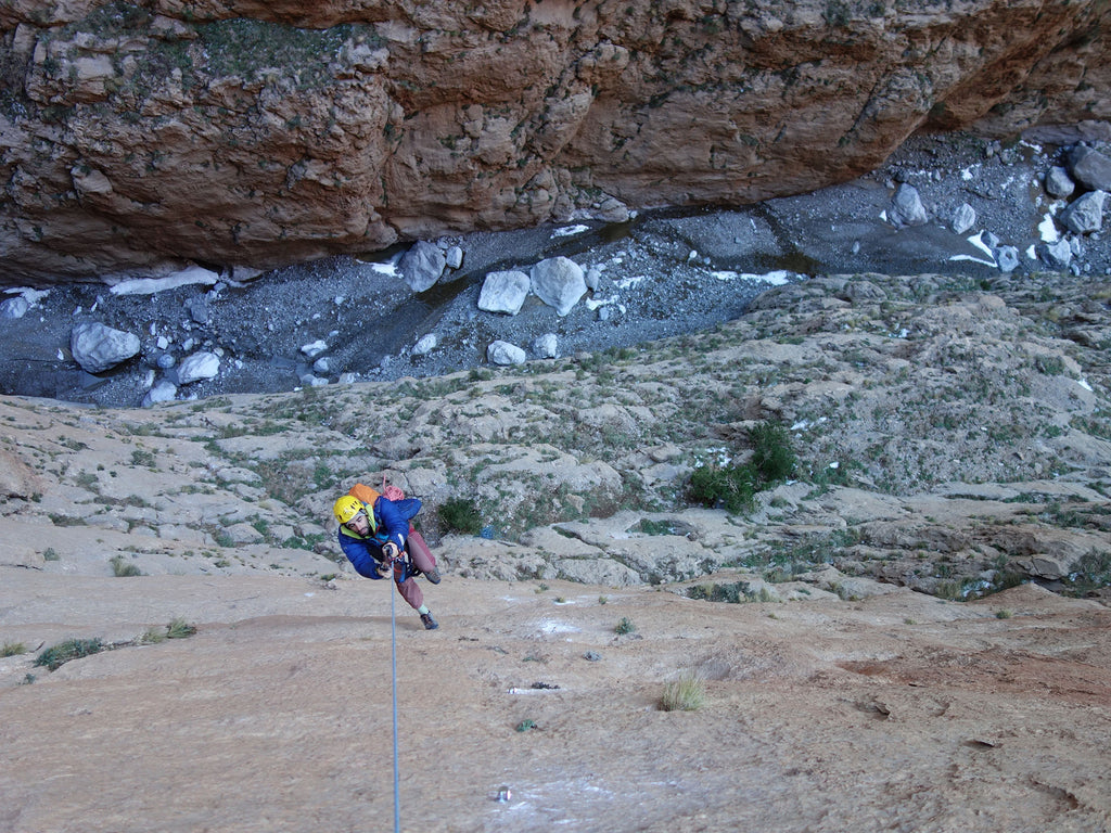 Stefano Regazzo on a long limestone route above the canyon floor in Taghia.
