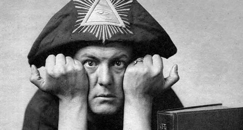 Portrait of Aleister Crowley in ceremonial clothing associated with his occult practices.